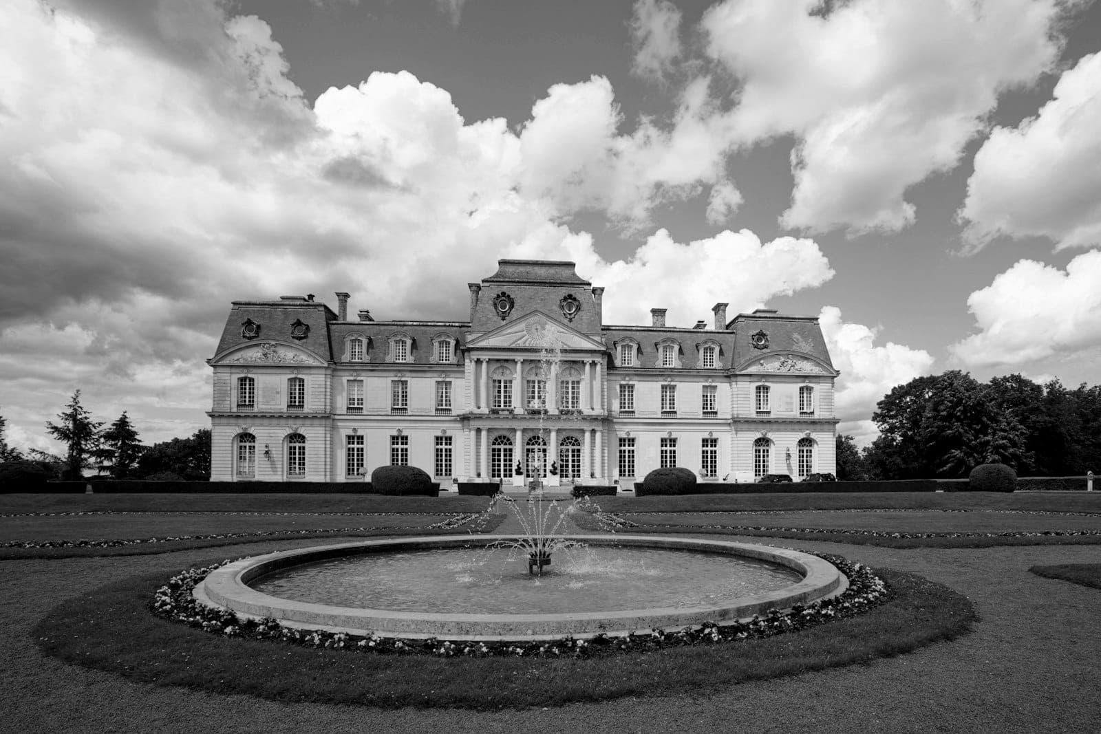 The château fountain and formal gardens